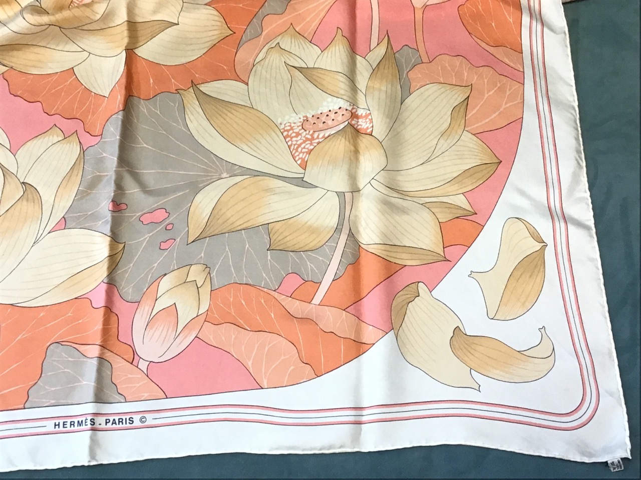 A Hermès Fleurs de Lotus silk scarf, having central panel of pale yellow lotus flowers on pink - Image 2 of 3