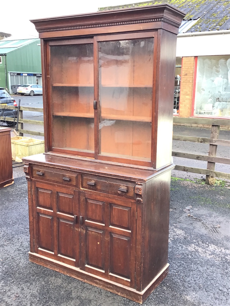 A Victorian stained bookcase cabinet with dentil cornice above a pair of sliding glass doors - Image 3 of 3