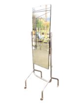 A modern rectangular cheval mirror on a chromed tubular stand with castors. (67.5in)