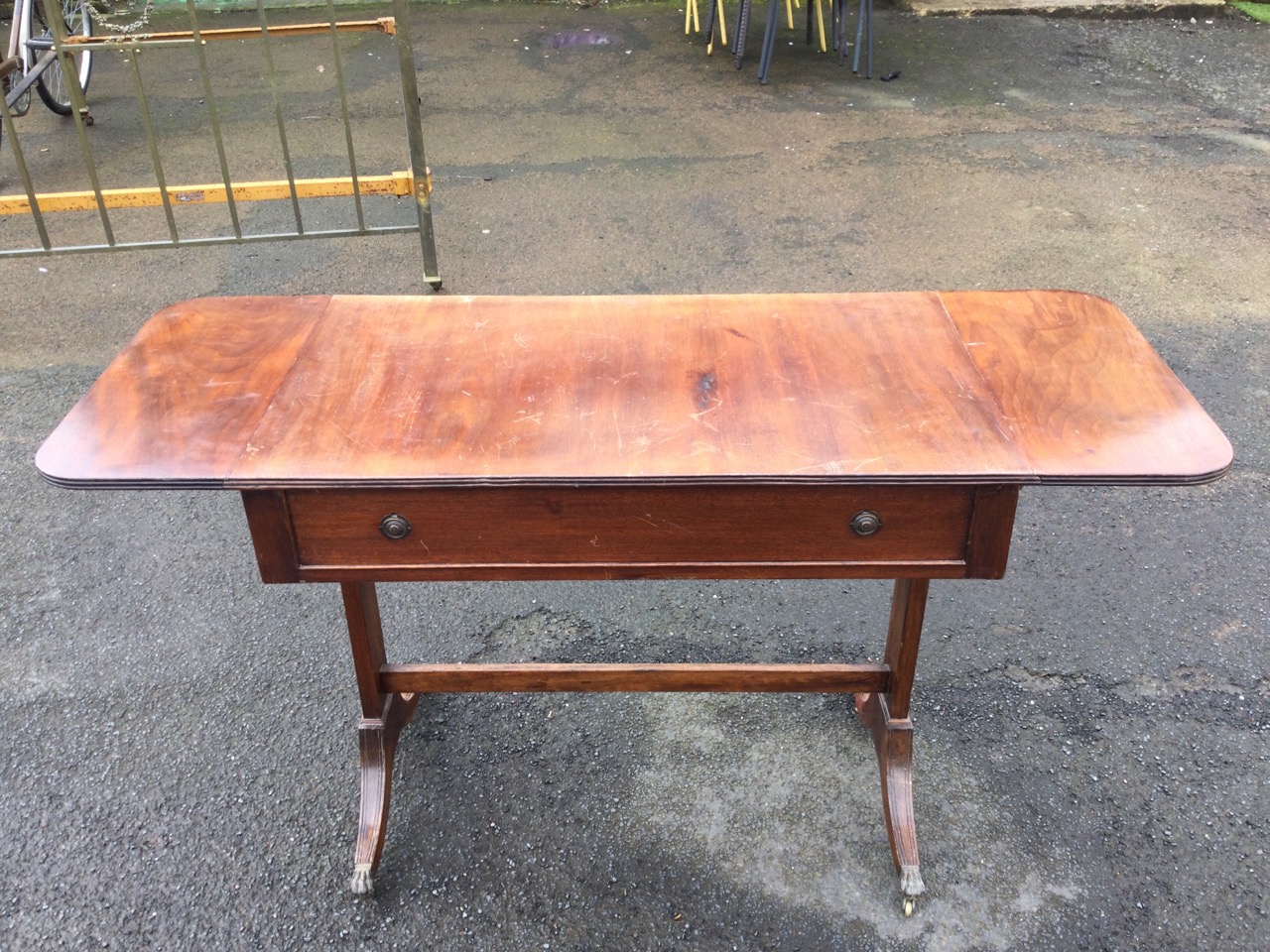 A regency style mahogany sofa table, the rectangular ribbed edge top with two drop leaves, above a - Image 2 of 3