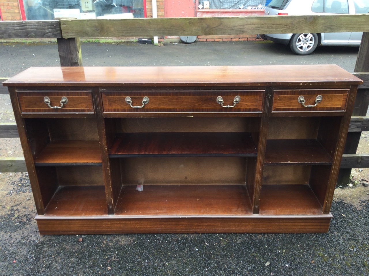 A mahogany crossbanded side cabinet with three frieze drawers above open adjustable shelves framed - Image 2 of 3