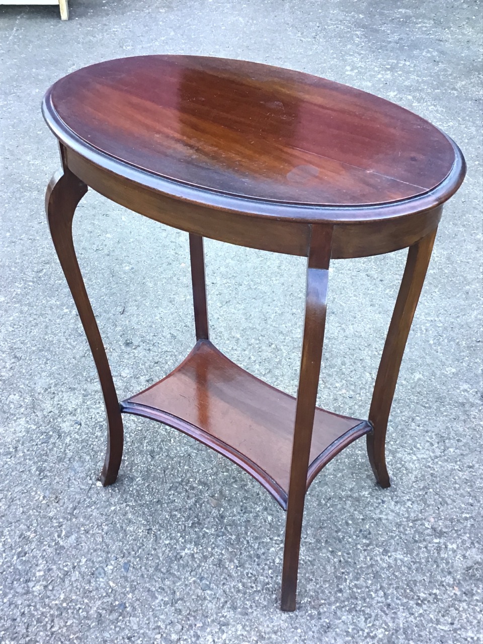 An Edwardian mahogany occasional table with oval moulded top above a plain apron, raised on square - Image 3 of 3