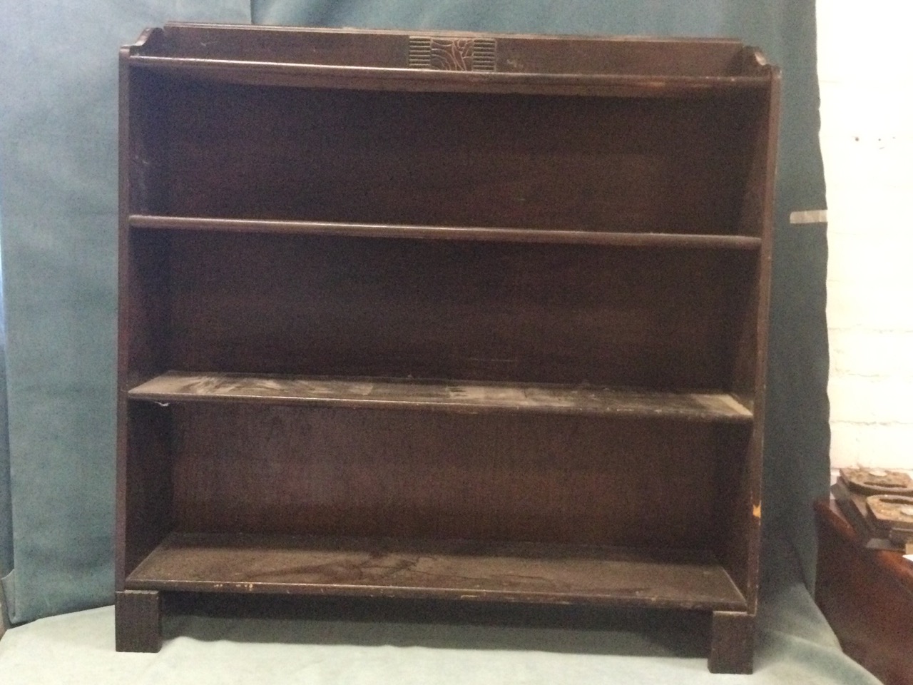 A 30s oak bookcase with raised back applied with a deco carved plaque, above four shelves raised - Image 2 of 3