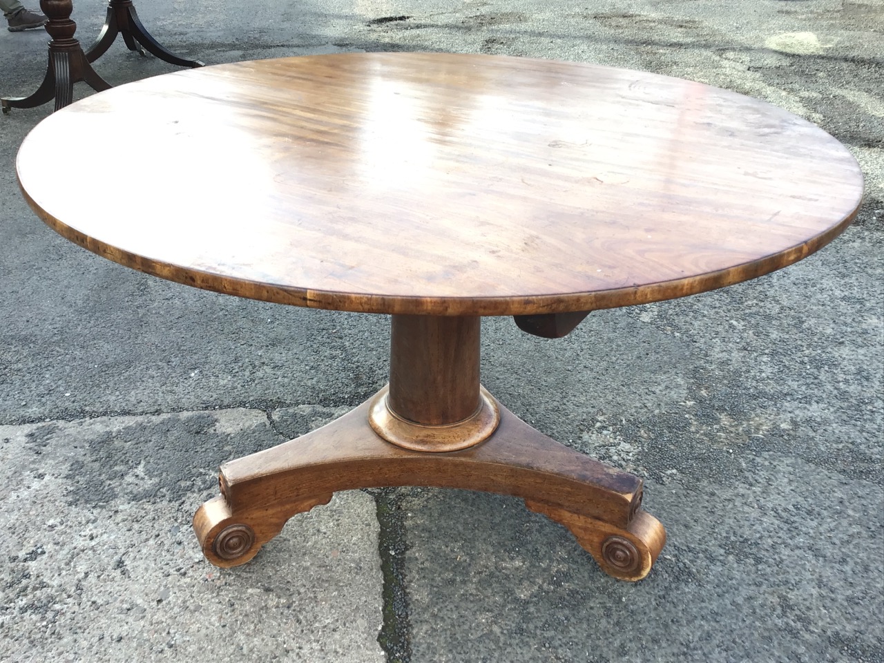 A William IV mahogany breakfast table, the circular top tilting on a tapering column, raised on a - Image 2 of 3