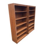 A pair of contemporary oak faced open bookcases, each with adjustable deep shelves. (35.75in x 15.