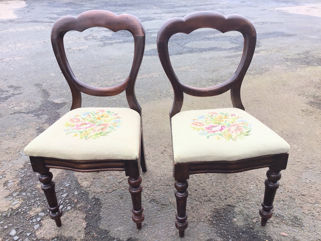 A pair of Victorian mahogany balloon-back chairs with drop-in upholstered seats, raised on turned - Image 2 of 3