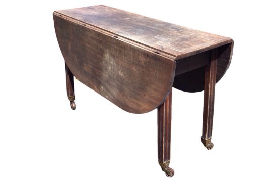 A mahogany Georgian dropleaf dining table having rounded rectangular top with two leaves supported - Image 1 of 3