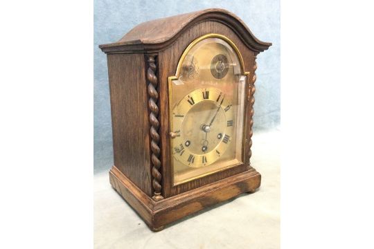 An Edwardian oak cased Gustav Becker chiming bracket clock with arched cornice above a bevelled - Image 1 of 3