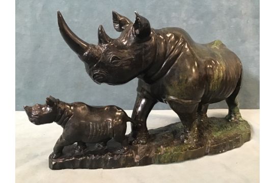 Marshall Sithole, a carved stone rhino group on naturalistic plinth, signed. (16.75in) - Image 1 of 3