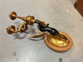 Reproduction brass Empire style wall sconce