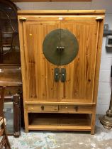 Eastern pine television cabinet/ cupboard with brass mounts and drawers and shelf below 106 cm wide,