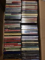 Two boxes of CDs