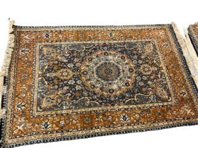 Near pair of Eastern rugs, each 197 x 123cm