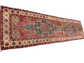 Kazak style runner, with two angular medallions, 312 x 79cm