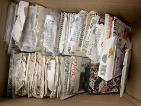 Selection of vintage sewing patterns, mainly uncut and large box of carded buttons