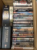 Three boxes of DVDs, mainly war and railway related