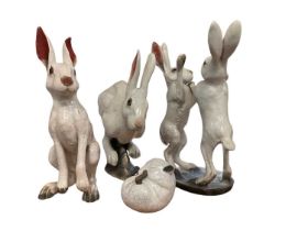 Four Brian Andrew raku sculptures of hares and a dormouse