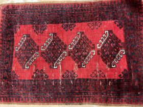 Bokhara rug and two Persian wool pile rugs (3)