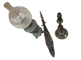 Antique Hookah base converted to a lamp, together with decorative oil lamp and an African carved woo