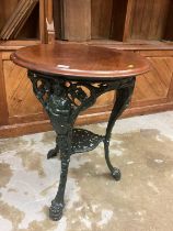 Victorian cast iron framed pub table with circular mahogany top and cast Britannia figure decoration