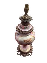 Continental painted porcelain and gilt metal mounted table lamp