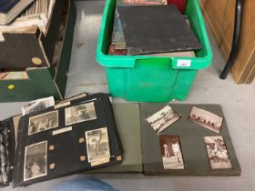 One box containing various photograph albums including one containing African scenes circa. 1920.