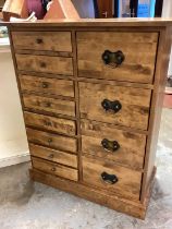 Laura Ashley Contempory chest of four deep drawers and eight short drawers on platform base 87cm wid