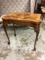 1930s Queen Anne-style walnut card table with shaped top