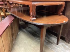 Edwardian oval extending dining table on taper legs and Spade feet