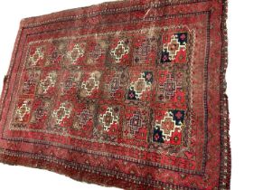 Rug with geometric pattern on red and blue ground