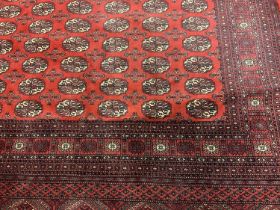 Large Tekke style rug, with six rows of sixteen quartered guls, 295 x 197cm