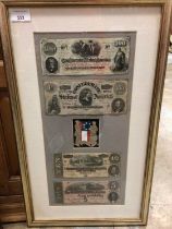 Two glazed frames containing bank notes, some reproductions noted.