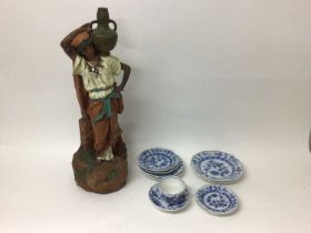 Group of Meissen blue and white Onion pattern china, and an Austrian--style terracotta figure of a w