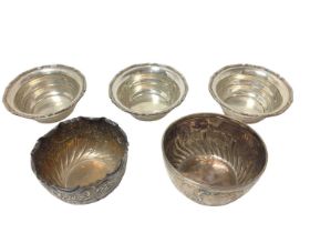 Two late Victorian silver bowls and a set of three Continental silver bowls