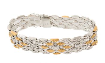 1970s 18ct white and yellow gold bracelet with articulated links, London 1974, 19.5cm.