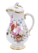 A Nymphenburg baluster shaped jug and cover, finely painted with flowers, circa 1780