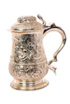 George III silver lidded tankard with later repoussé decoration