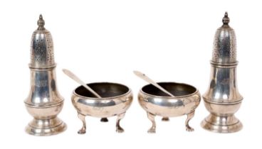 Tiffany & Co. American silver salts and matching spoons with a pair of silver casters