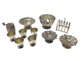 Silver toast rack, pepper grinder, pair of pedestal dishes and other items