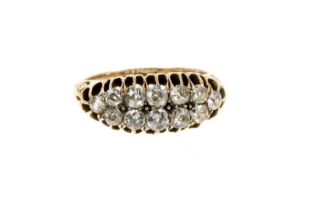 Victorian diamond two-row ring with graduated old cut diamonds in gold claw setting with carved gold