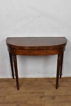 Regency mahogany and ebony inlaid D-shaped tea table, raised on turned legs and spool feet, 91cm wid