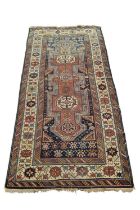 Kazak rug with five conjoined medallions