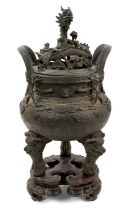 Large and impressive antique Chinese bronze censor on stand