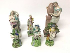 Group of six early 19th century Staffordshire pearlware glazed figures, including gardeners