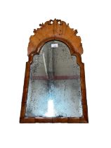 Early 18th century walnut fretwork mirror with original plate