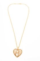 Boucheron 18ct gold and diamond heart shaped pendant necklace
