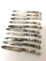 Ten Continental porcelain pistol grip knives