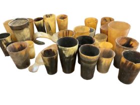 Collection of twenty-three 19th century horn beakers