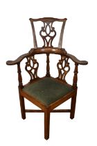 George III high backed elm corner chair, with pierced splat and slip in seat on internally chamfered