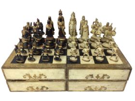 Italian carved wooden and gesso chess set in the form of Moors and Crusaders